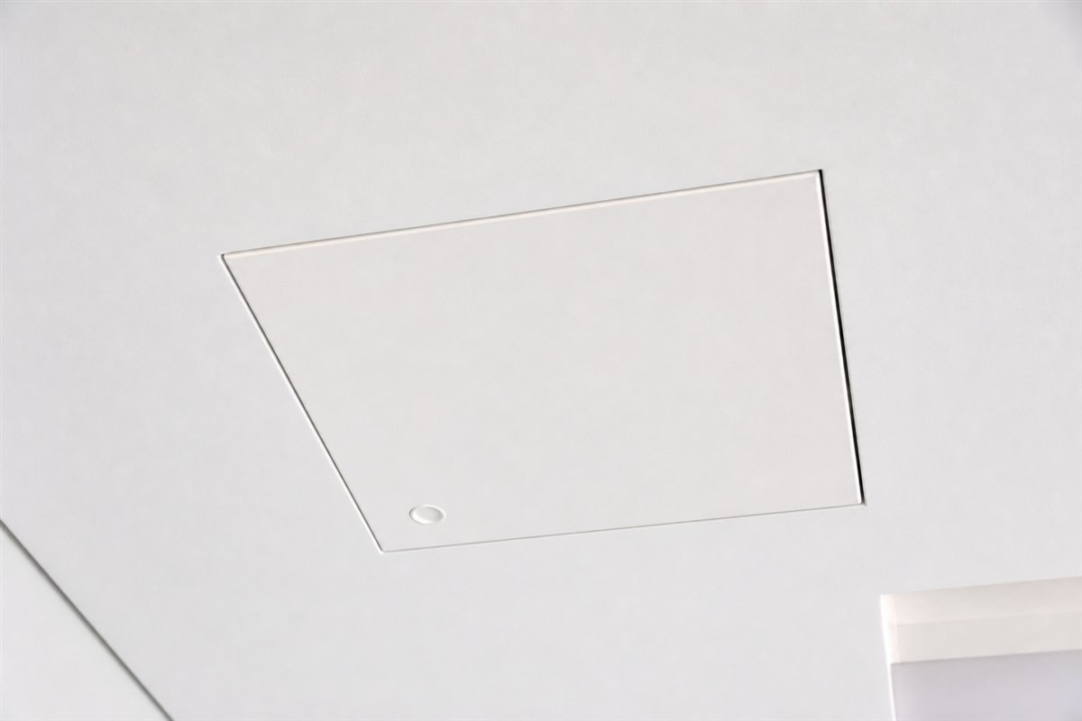 Square flush access hatch fitted into a smooth white ceiling canvas